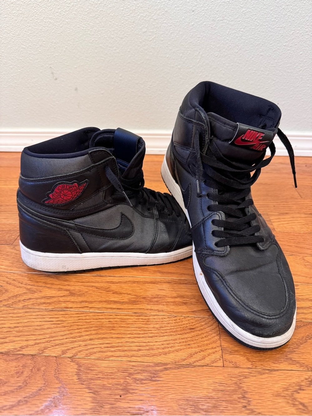 Nike Black High-Top Sneakers with Red Logos